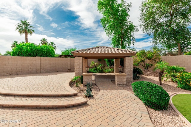 13204 W Palo Verde Dr, Litchfield Park, AZ 85340 - fenced backyard featuring a patio and a gazebo