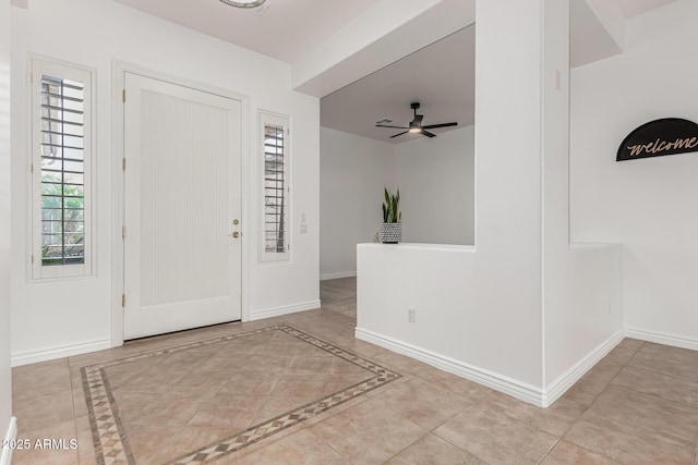 13204 W Palo Verde Dr, Litchfield Park, AZ 85340 - entryway with plenty of natural light, baseboards, and ceiling fan