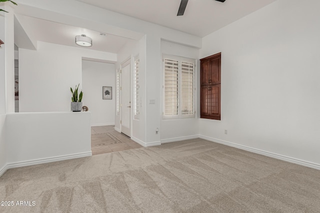 13204 W Palo Verde Dr, Litchfield Park, AZ 85340 - carpeted spare room with a ceiling fan and baseboards