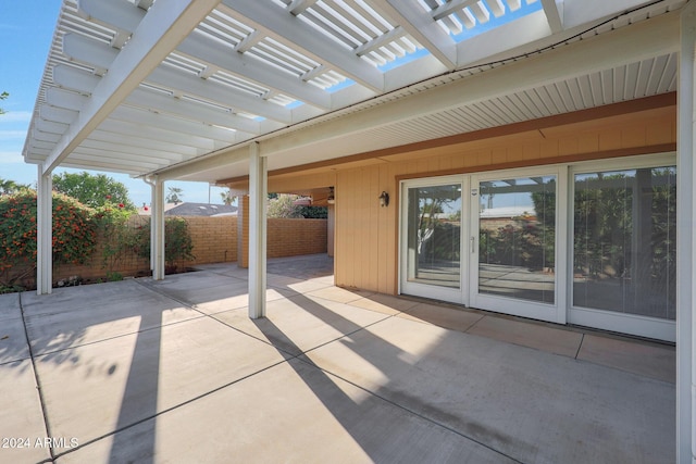 view of patio / terrace featuring a pergola and french doors