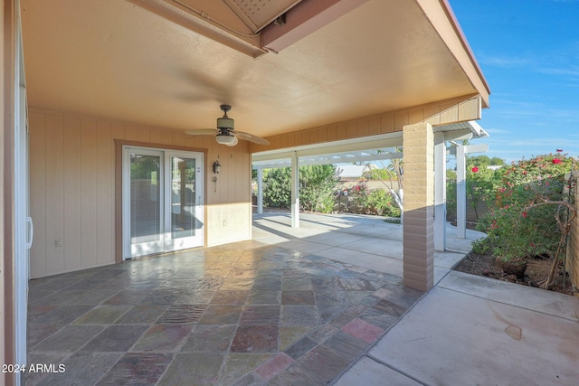 view of patio featuring ceiling fan