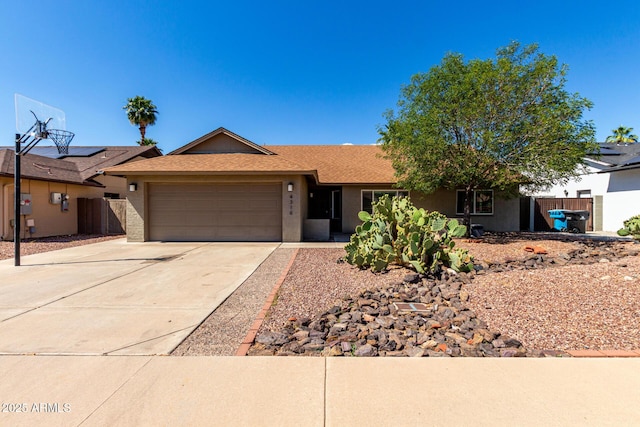 4316 E Janice Way, Phoenix, AZ 85032 - ranch-style house featuring a garage, driveway, and a shingled roof