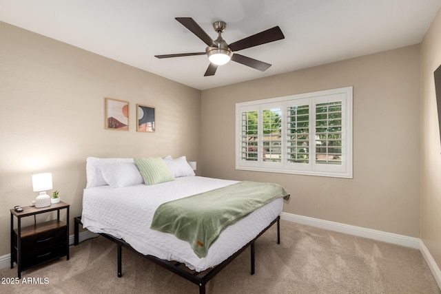4316 E Janice Way, Phoenix, AZ 85032 - bedroom with baseboards, carpet floors, and a ceiling fan