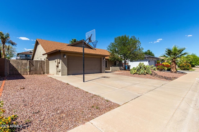 4316 E Janice Way, Phoenix, AZ 85032 - view of front of home featuring an attached garage, fence, driveway, and a shingled roof