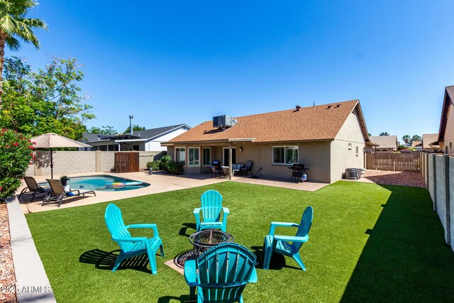 4316 E Janice Way, Phoenix, AZ 85032 - rear view of house featuring an outdoor fire pit, a patio, cooling unit, and roof with shingles