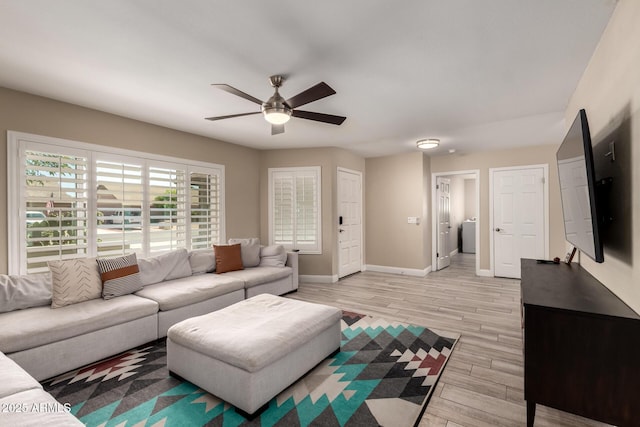 4316 E Janice Way, Phoenix, AZ 85032 - living room with ceiling fan, baseboards, and light wood-type flooring