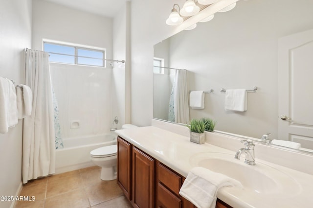 full bath featuring vanity, tile patterned floors, toilet, and shower / bath combo