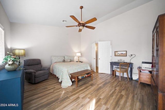 360 Bonita Dr, Wickenburg, AZ 85390 - bedroom featuring wood finished floors, vaulted ceiling, multiple windows, and a ceiling fan
