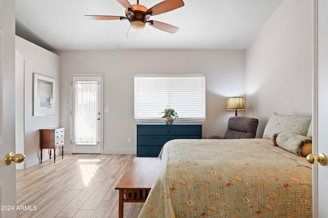 bedroom featuring ceiling fan and light hardwood / wood-style floors