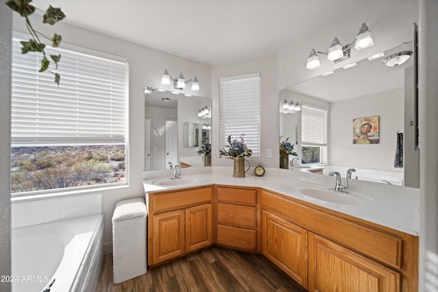360 Bonita Dr, Wickenburg, AZ 85390 - bathroom featuring a bath, double vanity, and wood finished floors