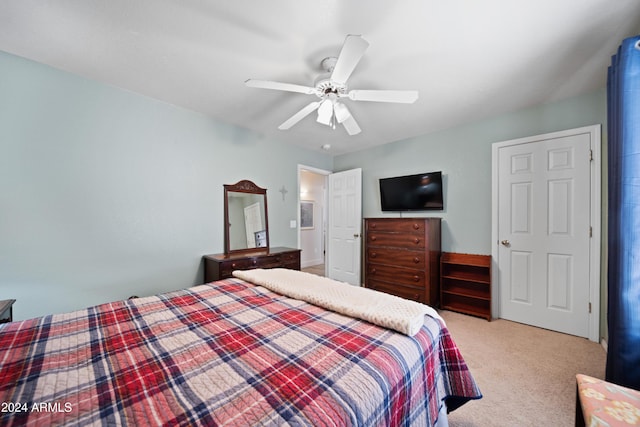 360 Bonita Dr, Wickenburg, AZ 85390 - bedroom with light colored carpet and a ceiling fan