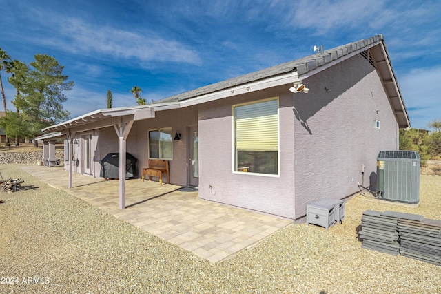 360 Bonita Dr, Wickenburg, AZ 85390 - back of property with stucco siding and a patio