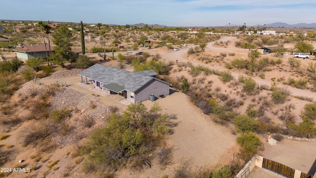 drone / aerial view featuring a mountain view