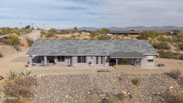 360 Bonita Dr, Wickenburg, AZ 85390 - rear view of property with a mountain view, roof with shingles, and a patio