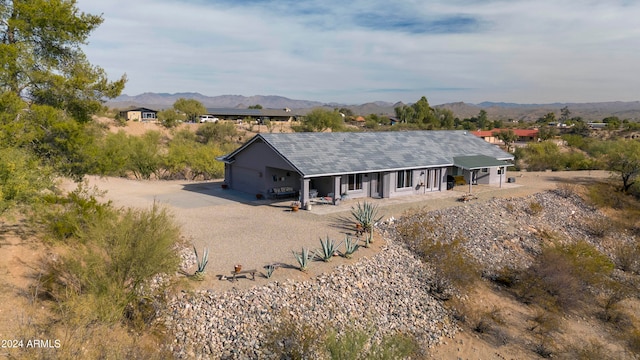 view of front facade featuring a mountain view