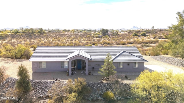 ranch-style house featuring a patio