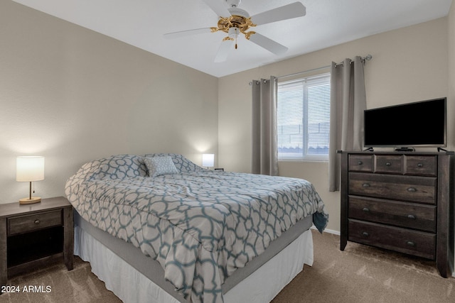 bedroom featuring ceiling fan and carpet floors