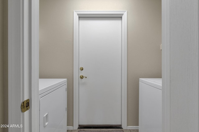 clothes washing area with washer and dryer