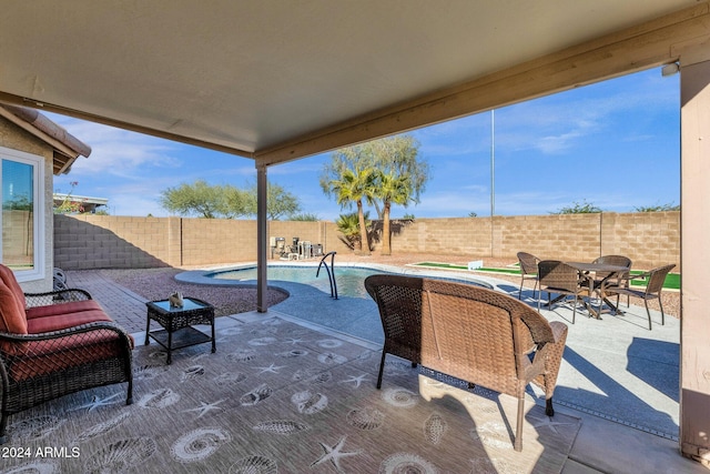 view of patio with a pool with hot tub