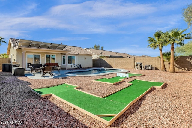 view of community with a pool and a patio