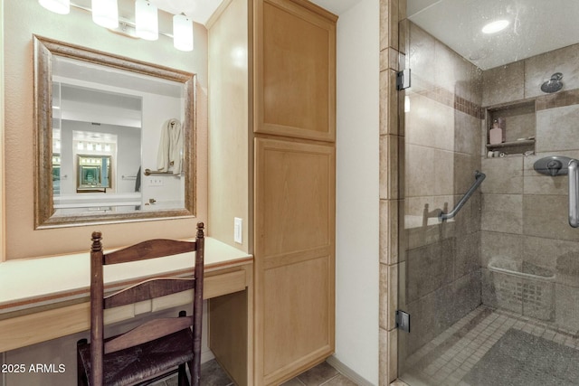 bathroom featuring a shower stall