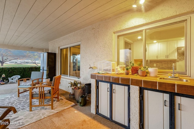 view of patio featuring a sink