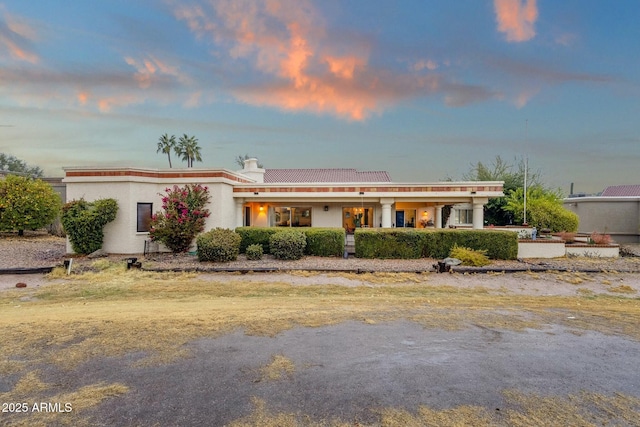 view of front of property featuring stucco siding