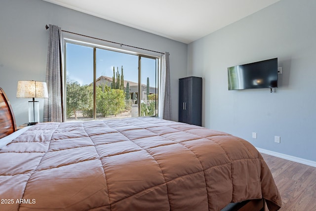 bedroom featuring light wood-type flooring