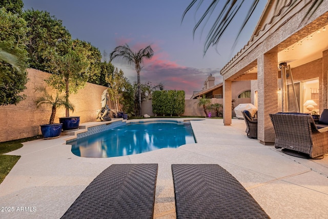 view of pool with a patio area, a fenced backyard, and a fenced in pool