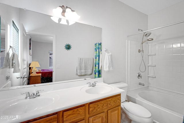 full bathroom with vanity, washtub / shower combination, and toilet