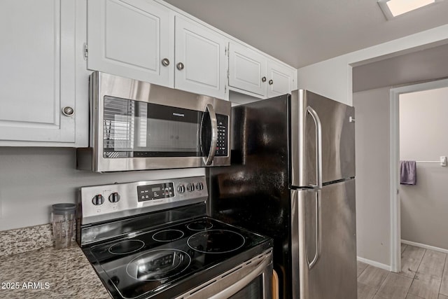 7126 N 19th Ave Unit 152, Phoenix, AZ 85021 - kitchen with stainless steel appliances and white cabinets