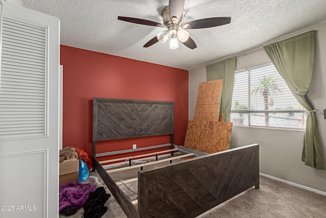 7126 N 19th Ave Unit 152, Phoenix, AZ 85021 - bedroom with carpet floors, a textured ceiling, and a ceiling fan