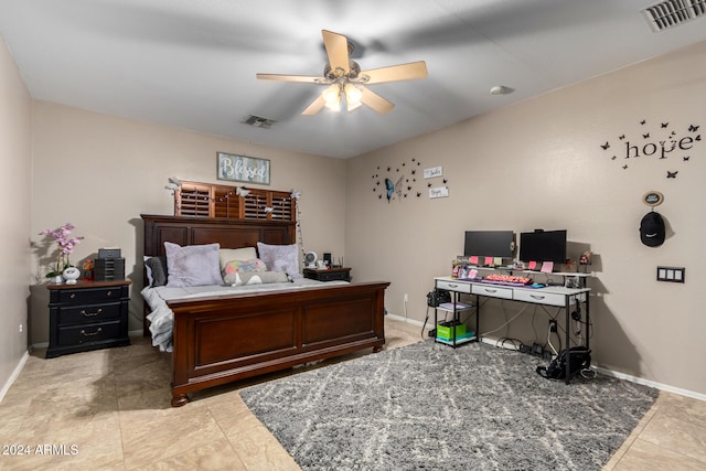 tiled bedroom with ceiling fan