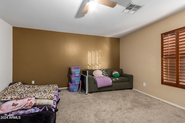 carpeted bedroom featuring ceiling fan