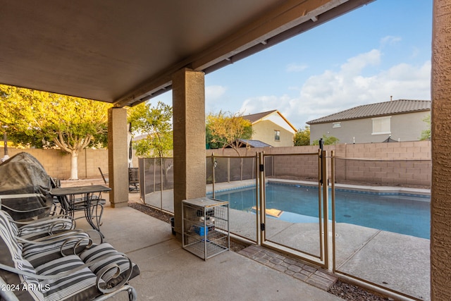 view of pool featuring a patio area