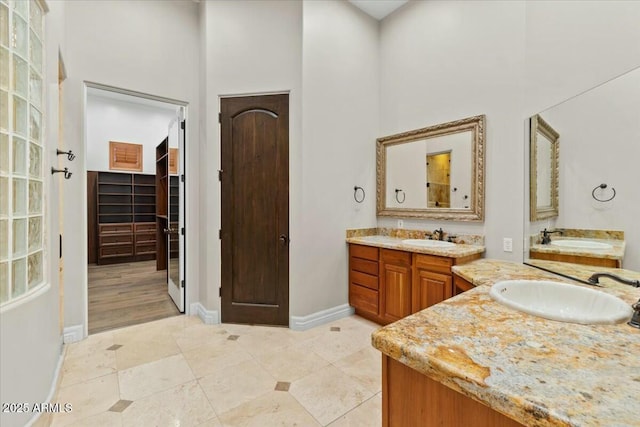 bathroom featuring vanity and tile patterned flooring