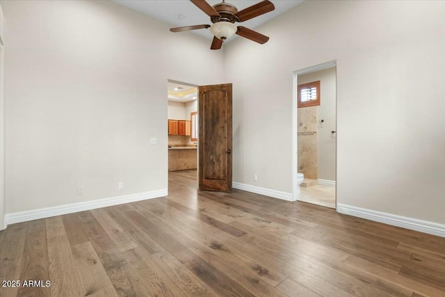 interior space featuring light hardwood / wood-style floors and ceiling fan