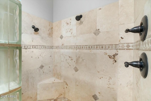 details featuring a tile shower