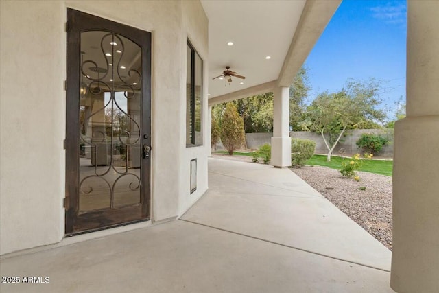 view of patio / terrace featuring ceiling fan