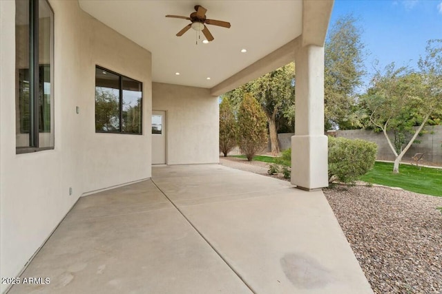 view of patio featuring ceiling fan