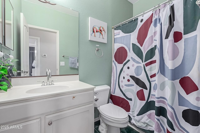 bathroom with vanity, a shower with curtain, and toilet