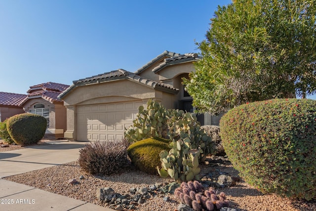 view of front of home with a garage