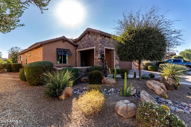 view of front of property with a garage