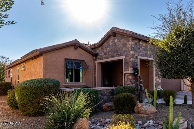 view of front of home with a garage