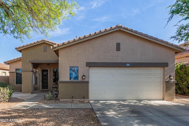 839 E Leo Pl, Chandler, AZ 85249 - view of front of home featuring stucco siding, an attached garage, driveway, and a tiled roof