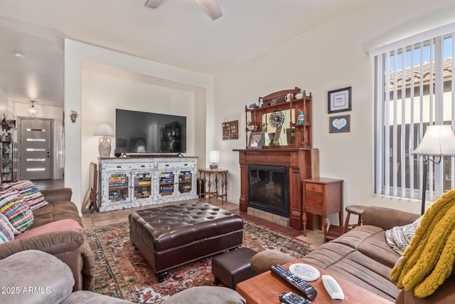 839 E Leo Pl, Chandler, AZ 85249 - living room featuring a ceiling fan and a glass covered fireplace