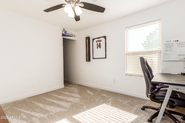 home office featuring ceiling fan and light colored carpet