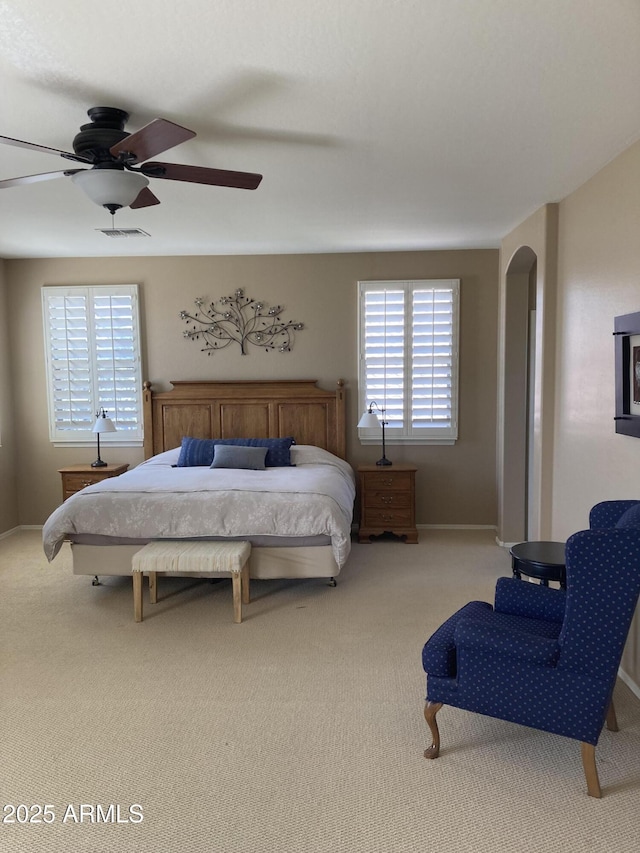 bedroom featuring ceiling fan and carpet flooring