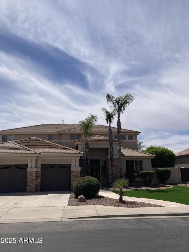 view of front of house with a garage