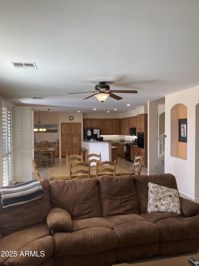 living room with ceiling fan